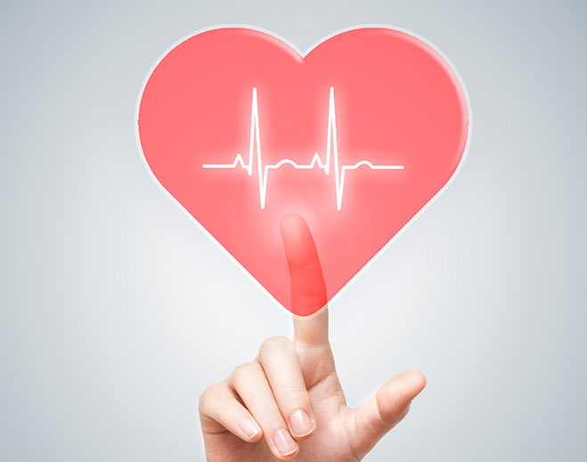 Hand pointing a heart-shaped health icon