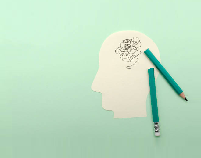 Silhouette head with pencil